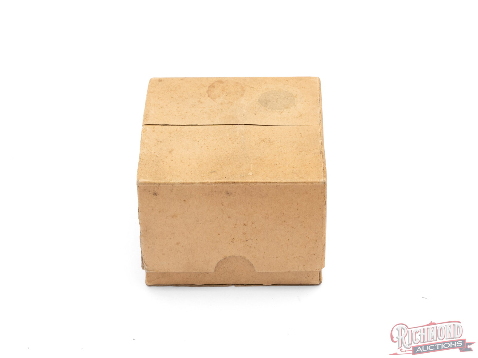 Full Box of US Cartridge Co. 12 Gauge New Rapid Empty Primed Shells: This is a unlabeled two piece box that contains 25 empty primed shells with the headstamp "US No. 12 New Rapid". Shells show spots of corrosion and lid is separated on one corner. Condition GOOD
