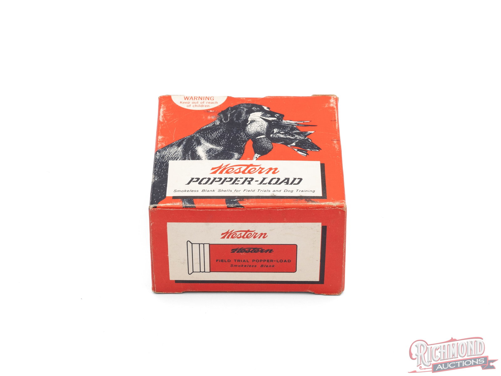 Full Box of Western 12 Gauge Popper Load Blank Shells: This is a full box of 12 gauge Smokeless blank shells made by Winchester Western Division. These shells were used for Dog training and Field Trials. Box features the graphic of a dog retrieving a duck