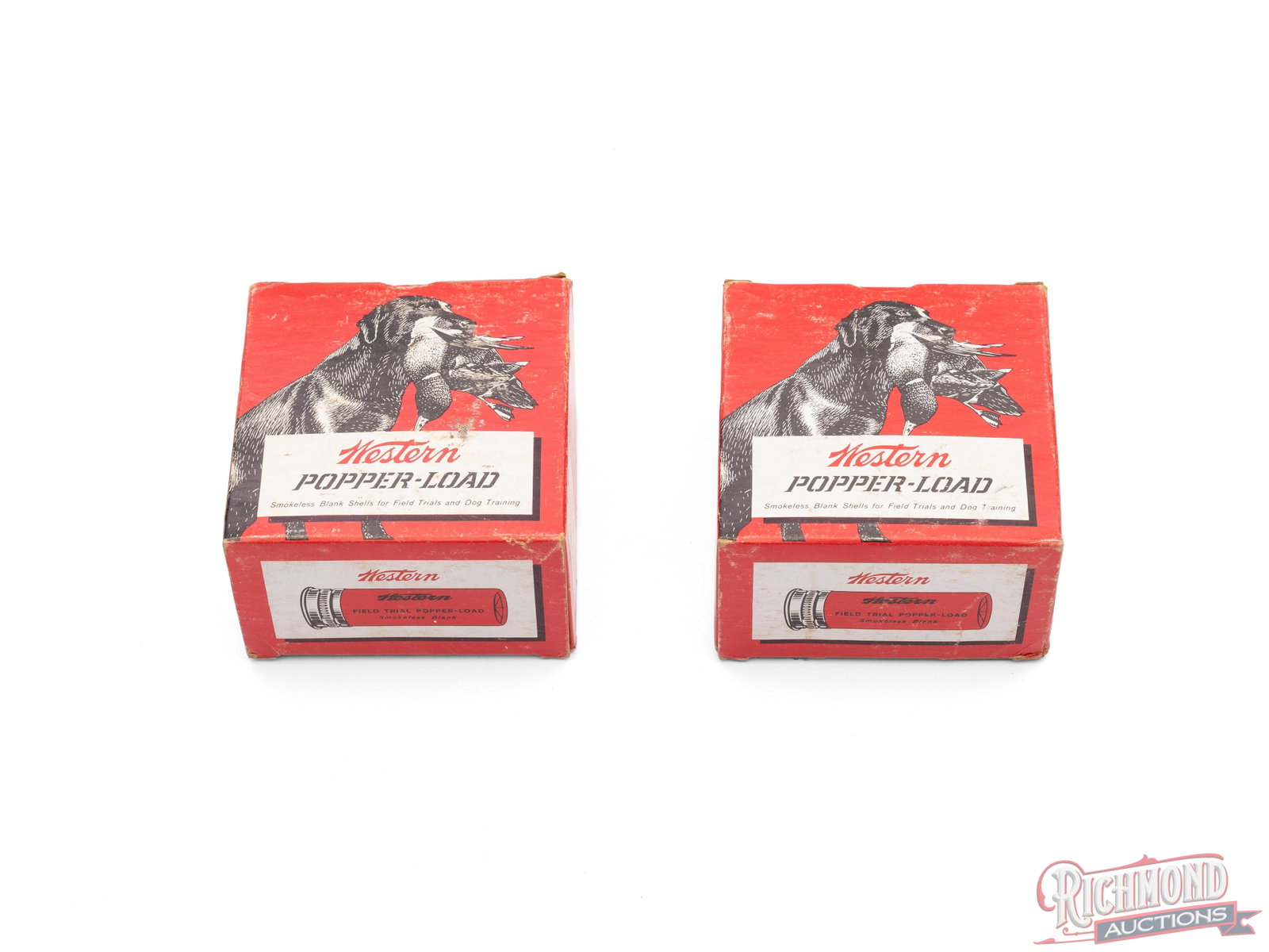 Two Boxes of Western 12 Gauge Popper Load Shotgun Shells: This lot contains 2 boxes of Western Popper Load blank shells used for Field Trials and training. One box is full and the second contains 24 shells. Both boxes contain 12 gauge 2 3/4" shells.