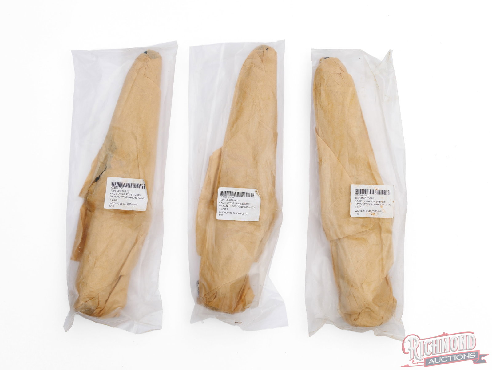 3 US M7 Bayonets With Scabbards Sealed In Plastic: These 3 bayonets are factory wrapped in paper and sealed in plastic. Each bayonet is labeled on the outside with "Bayonet w/Scabbard (M-7), 1 Each" Condition VERY GOOD