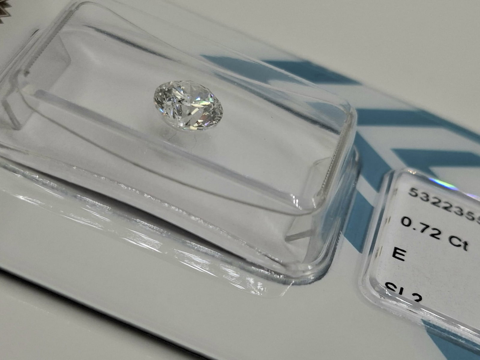 0.72 Carat Round Brilliant Natural Diamond - IGI Certified - E Color / SI2 - Sealed - 3