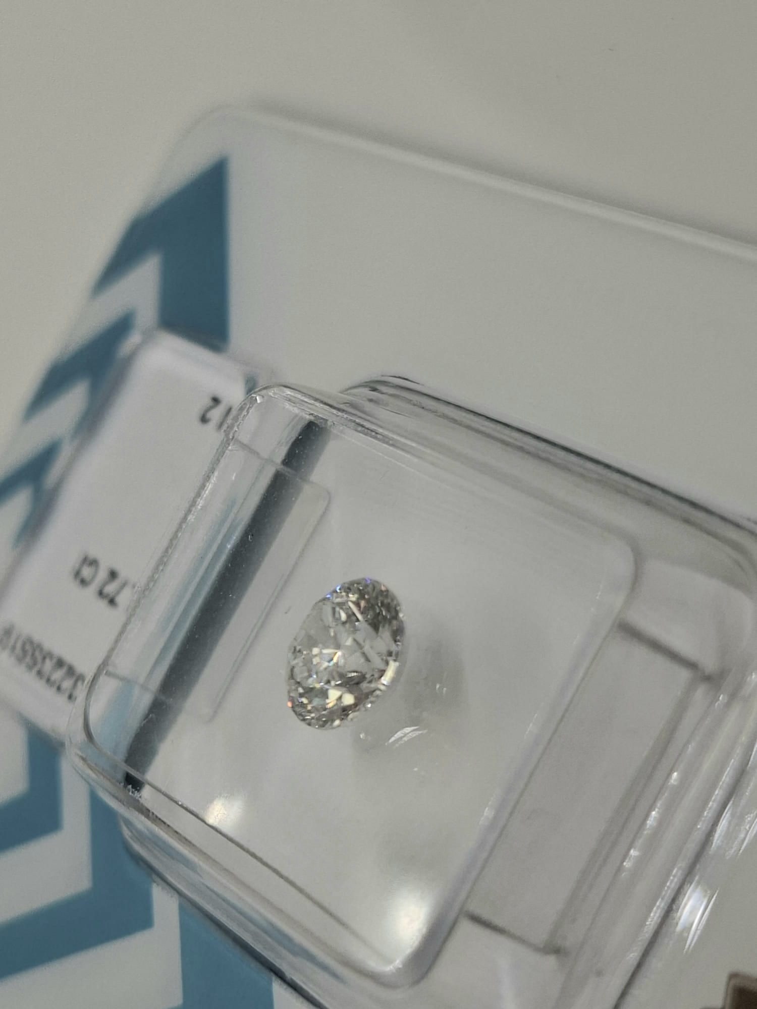 0.72 Carat Round Brilliant Natural Diamond - IGI Certified - E Color / SI2 - Sealed - 4