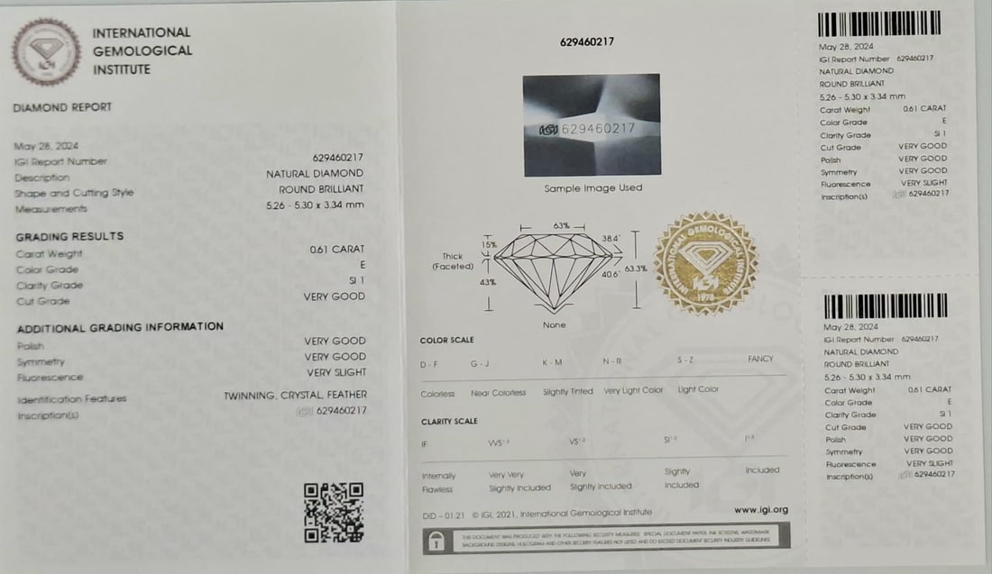 0.61 Carat E / SI1 Round Brilliant Diamond - IGI Certified - Sealed - 2