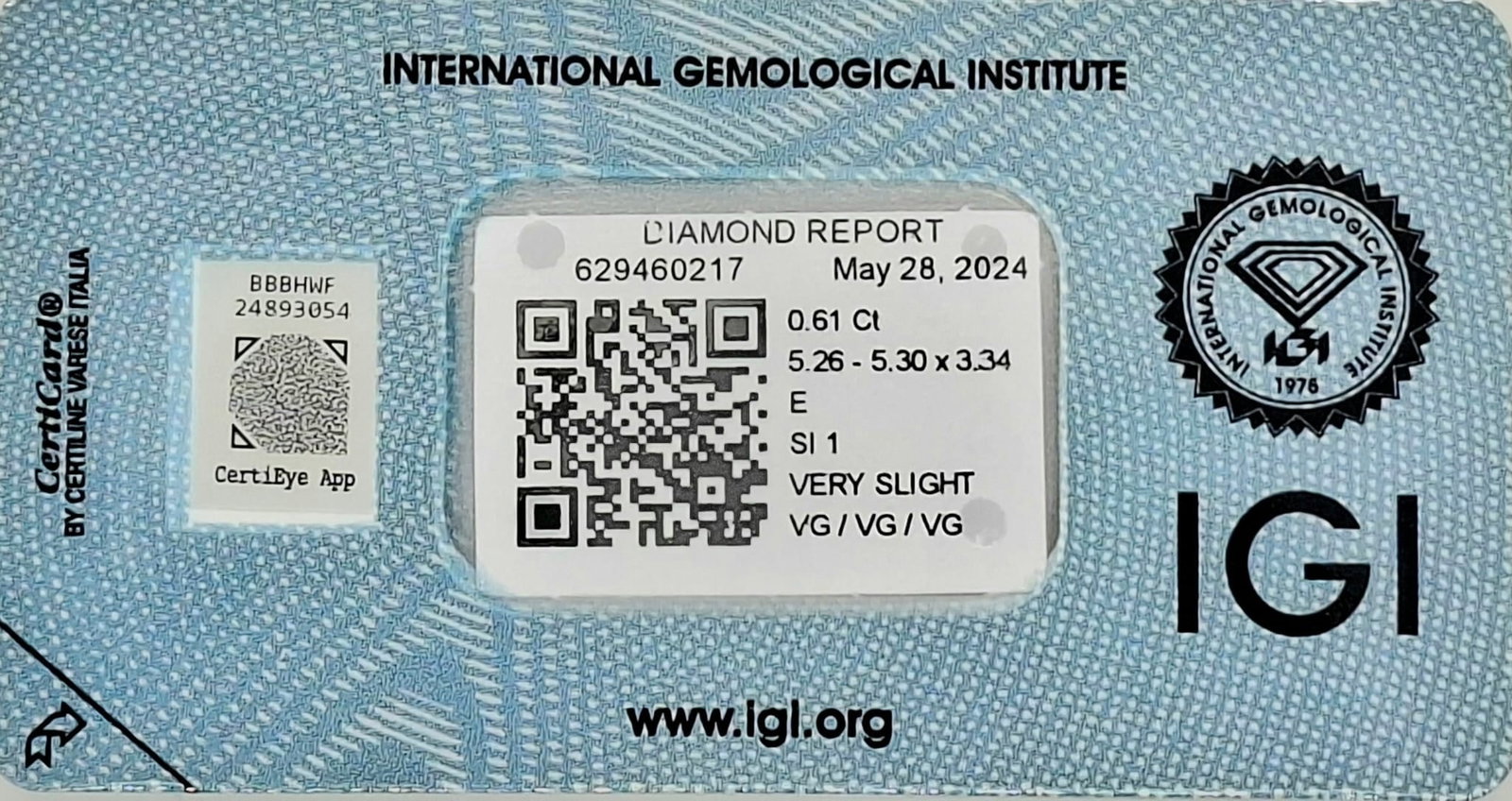 0.61 Carat E / SI1 Round Brilliant Diamond - IGI Certified - Sealed - 3