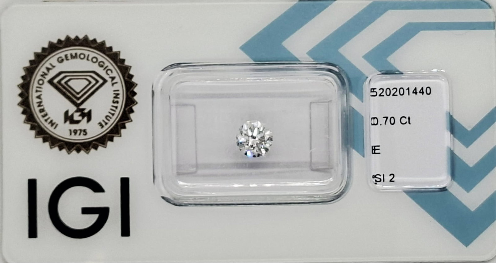 0.70 Carat E / SI2 Round Brilliant Diamond - IGI Certified - Sealed - 7