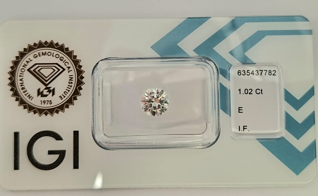 1.02 Carat E / IF Round Brilliant Diamond - Triple Excellent - IGI Certified - Sealed: 1.02 Carat E / IF Round Brilliant Diamond Official IGI Certified • Natural Earth-Mined • Internally Flawless • Triple Excellent • Sealed in CertiCard Official Certificate Details