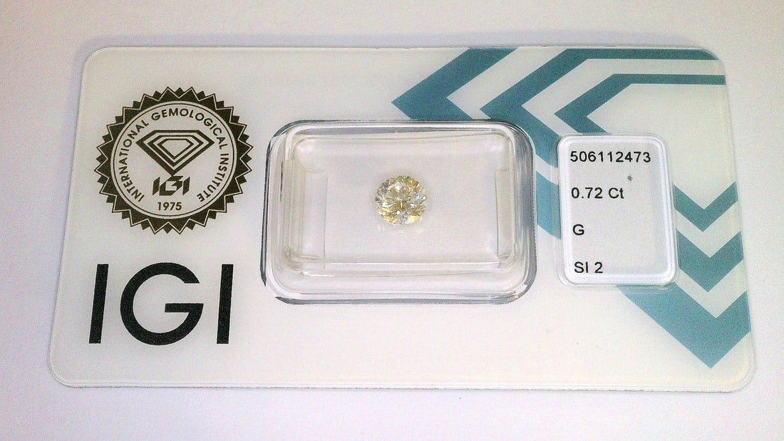 0.72 Carat G / SI 2 Round Brilliant Diamond - IGI Certified - Sealed - 2