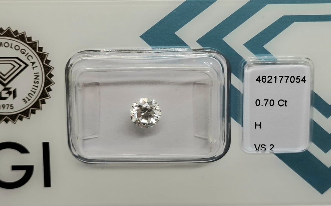 0.70 Carat H / VS 2 Round Brilliant Diamond - IGI Certified - Sealed - 5
