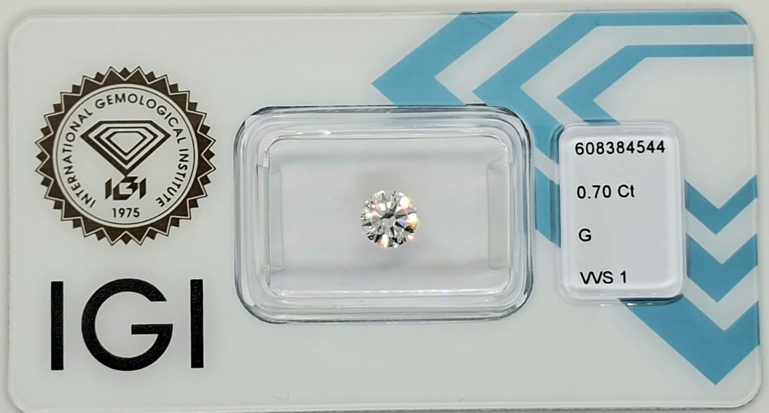 0.70 Carat G / VVS 1 Round Brilliant Diamond - IGI Certified - Sealed: 0.70 Carat G / VVS 1 Round Brilliant Diamond Official IGI Certified • Natural Earth-Mined • G Color • VVS 1 Clarity • Sealed in CertiCard Official Certificate Details IGI Report