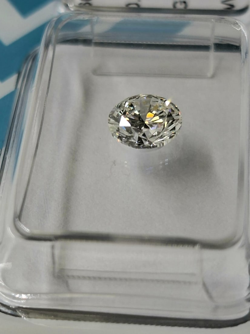 0.70 Carat G / VVS 1 Round Brilliant Diamond - IGI Certified - Sealed - 6
