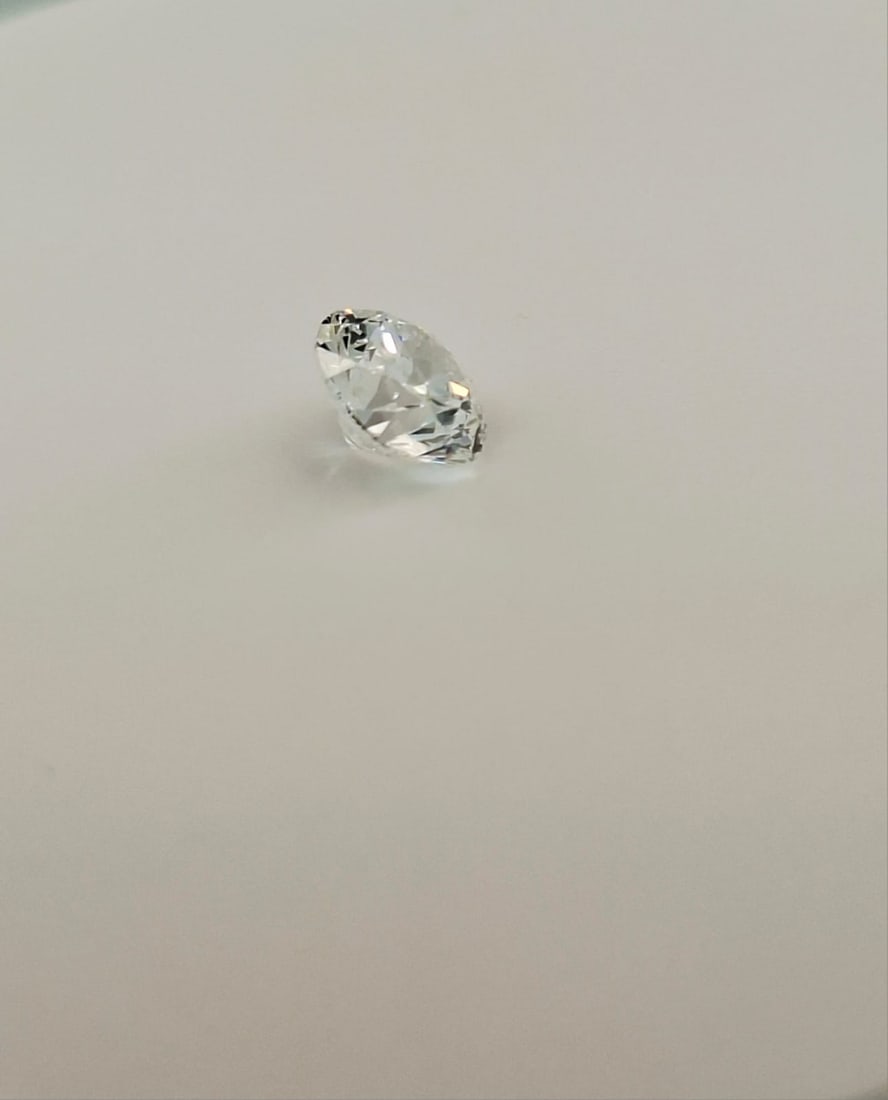 0.66 CT Round Brilliant Natural Diamond - D Color / VS2 Clarity - GIA Certified - 5
