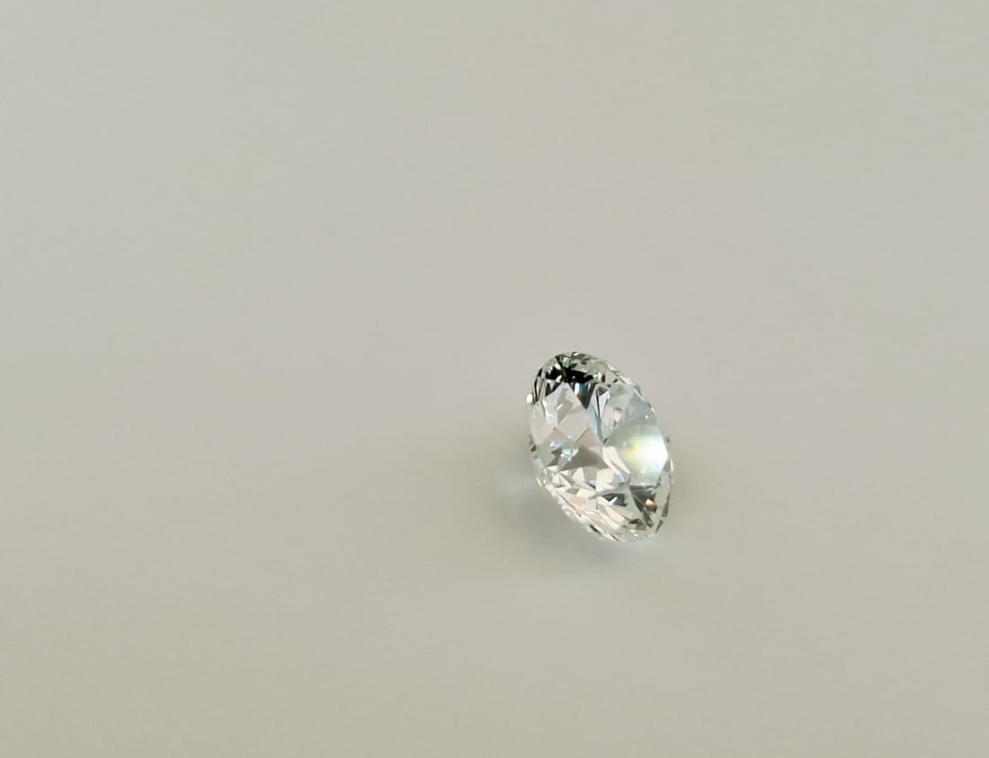 0.66 CT Round Brilliant Natural Diamond - D Color / VS2 Clarity - GIA Certified - 6