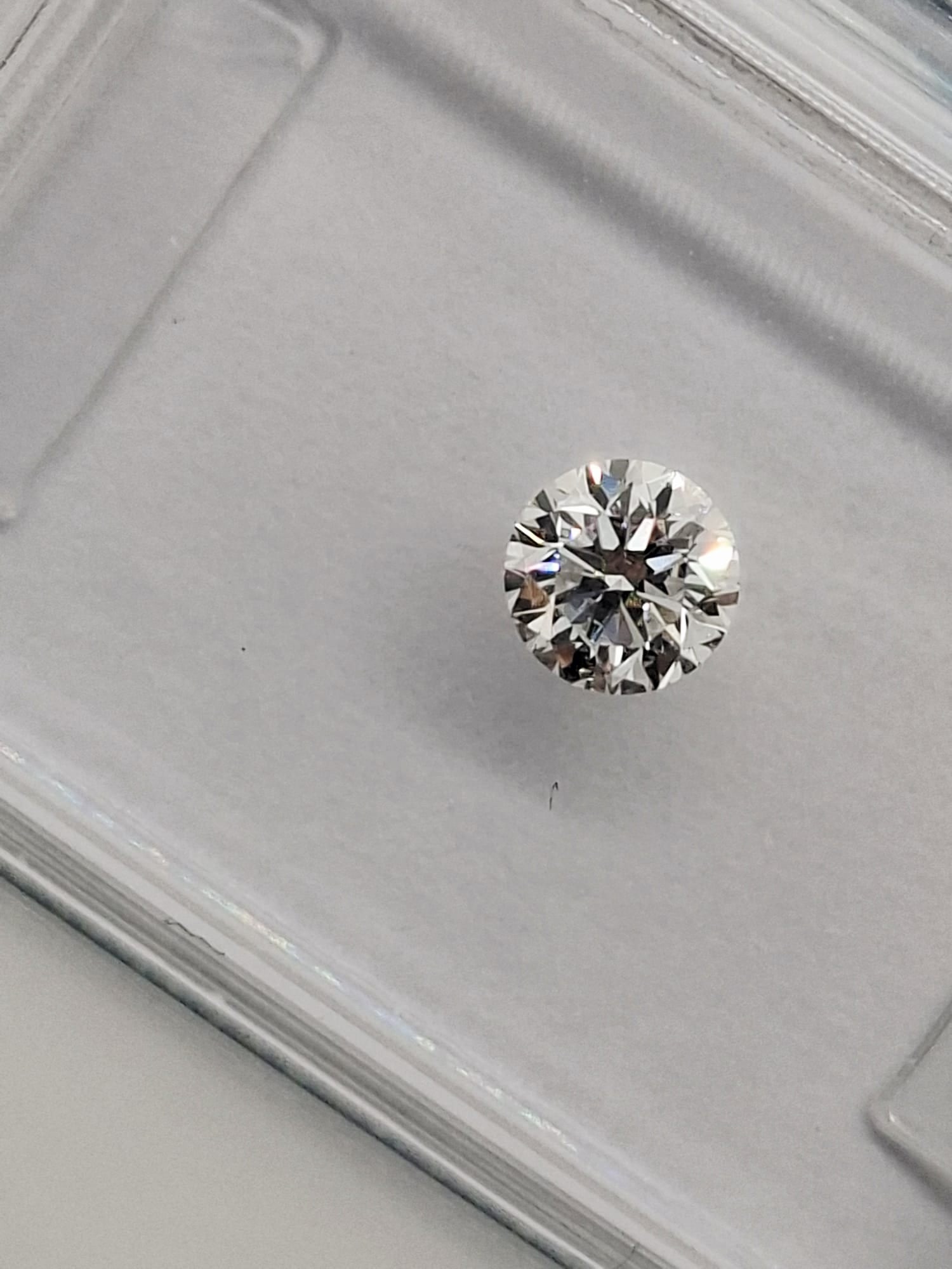 0.46 CTW Pair Round Brilliant Diamonds (0.23 CT Each) -D Color-Internally Flawless (IF)- IGI Cer. - 4