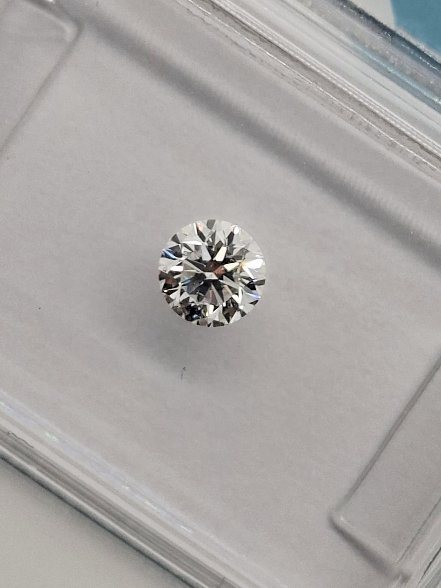 0.46 CTW Pair Round Brilliant Diamonds (0.23 CT Each) -D Color-Internally Flawless (IF)- IGI Cer. - 5
