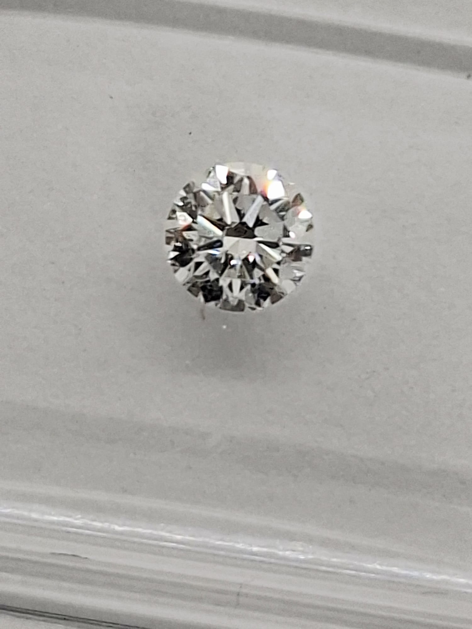 0.46 CTW Pair Round Brilliant Diamonds (0.23 CT Each) -D Color-Internally Flawless (IF)- IGI Cer. - 8