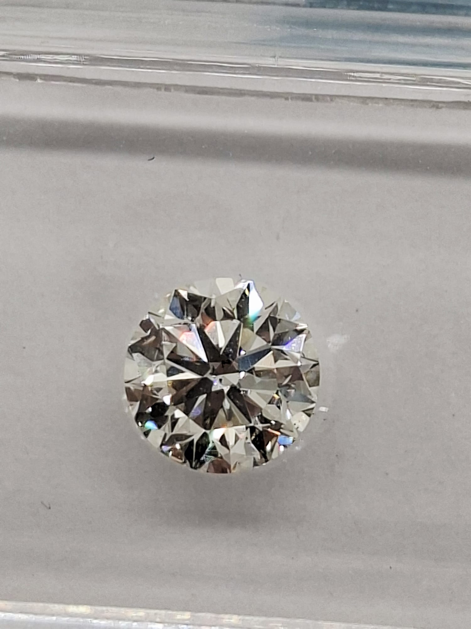 0.70 CT Natural Round Brilliant Diamond H VS2 VG/EX/VG IGI Certified Sealed: 0.70 Carat Natural Round Brilliant Diamond VS2 Clarity • Very Good Cut • Excellent Polish • IGI Certified • Factory Sealed Natural & Certified: A stunning 0.70 Carat natural