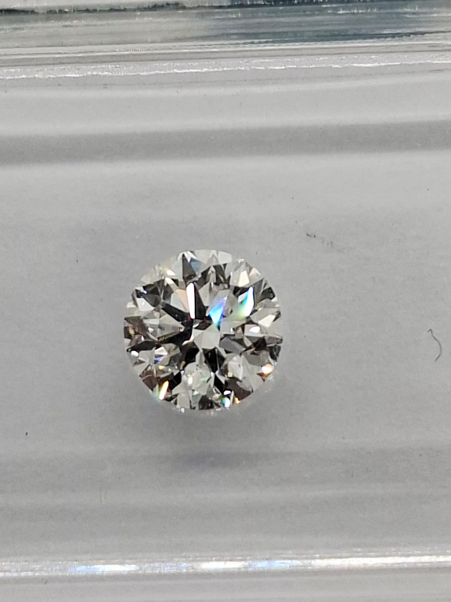 0.52 CT Natural Round Diamond E VVS1 IGI Certified Loose Stone: 0.52 CT Natural Round Brilliant Diamond IGI Certified • E Color • VVS1 Clarity • Natural Loose Diamond • Free Shipping Natural Elegance: A brilliant 0.52 carat natural loose round
