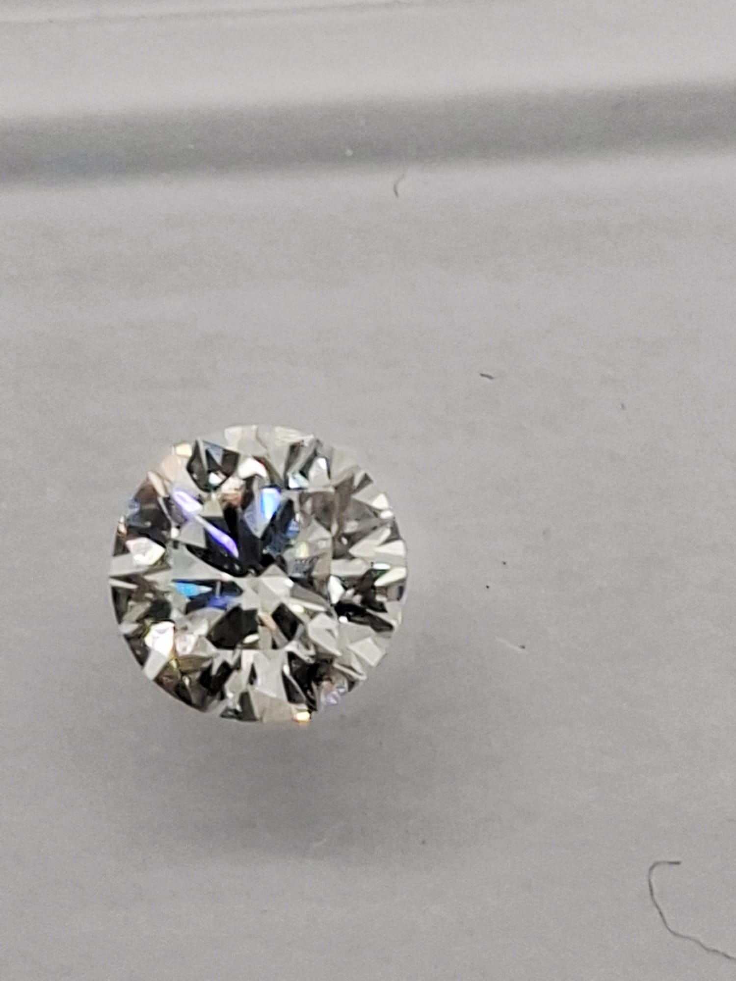 0.51 TW Round Brilliant Natural Diamond Pair 0.25 CT & 0.26 CT G VVS2 IGI Sealed - 9