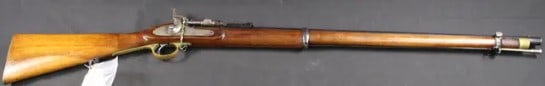 24ga Shot-Shell Snider Conversion 'Short Rifle' (FMI): An Enfield-Snider conversion rechambered in 24 gauge that is in good to very good condition overall. The barrel appears to not be original and is made by RB Rodda and Co in the 19th century in
