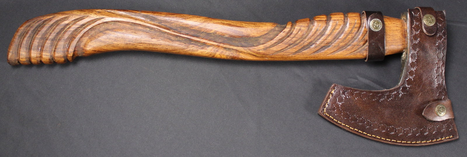 Hand Carved Nordic Style Trowing Axe (SAE): Estimated shipping parcel size (LxWxH) 24 inches x 8 inches x 8 inches. Please note, shipping estimates are provided for LiveShipping calculations only and may vary based on weight and location. The