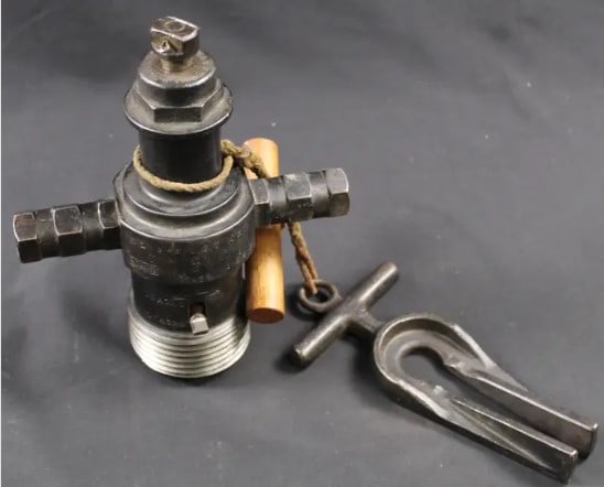 WWII British MK II Anti-Submarine Depth Charge Gun Breech (FMI): A WWII British marked depth charge gun breech in very good condition overall. The threads are in very good condition and this could be used to make a new DD with proper licensing. Made of machined