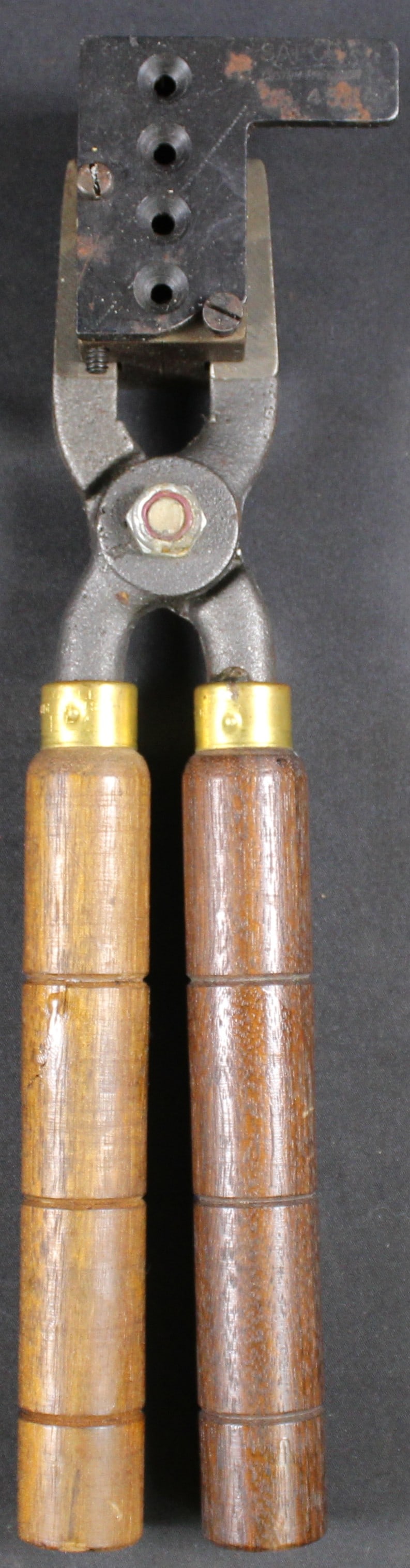 Die Cast Bullet Mould with Handles (FMI): This SAECO Custom Precision die cast bullet mould is in good to very good condition showing some surface rust that should clean up nicely. This tool produces a .45 caliber, 225-grain round nose (RN)