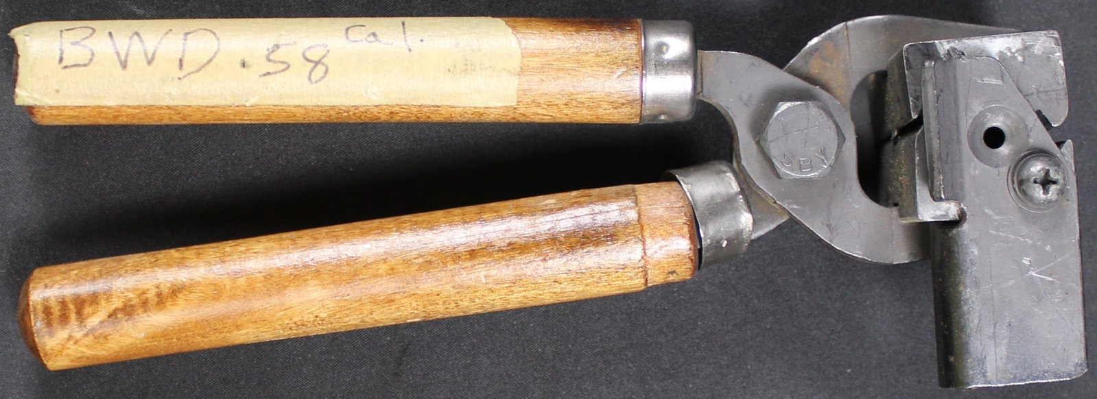 Die Cast Bullet Mould with Handles (FMI): This Lee bullet mould creates a .58 caliber bullet. This mould shows some wear from past usage overall making the condition of this piece as good as it does still operate as intended. Bidders are