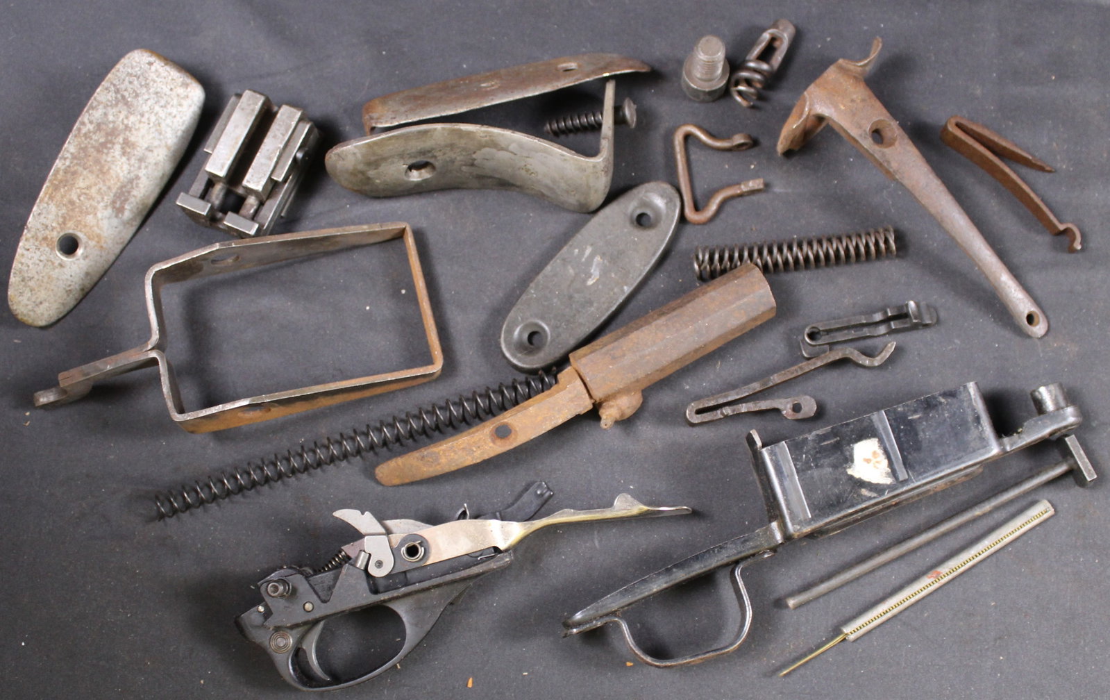 Group Lot: Firearms Parts Lot (FMI): Description coming soon Bidders are welcome to preview items in person during our normal operating hours Tuesday through Saturday 11am-6pm. Estimated shipping parcel size (LxWxH) 10 inches x 8 inches 