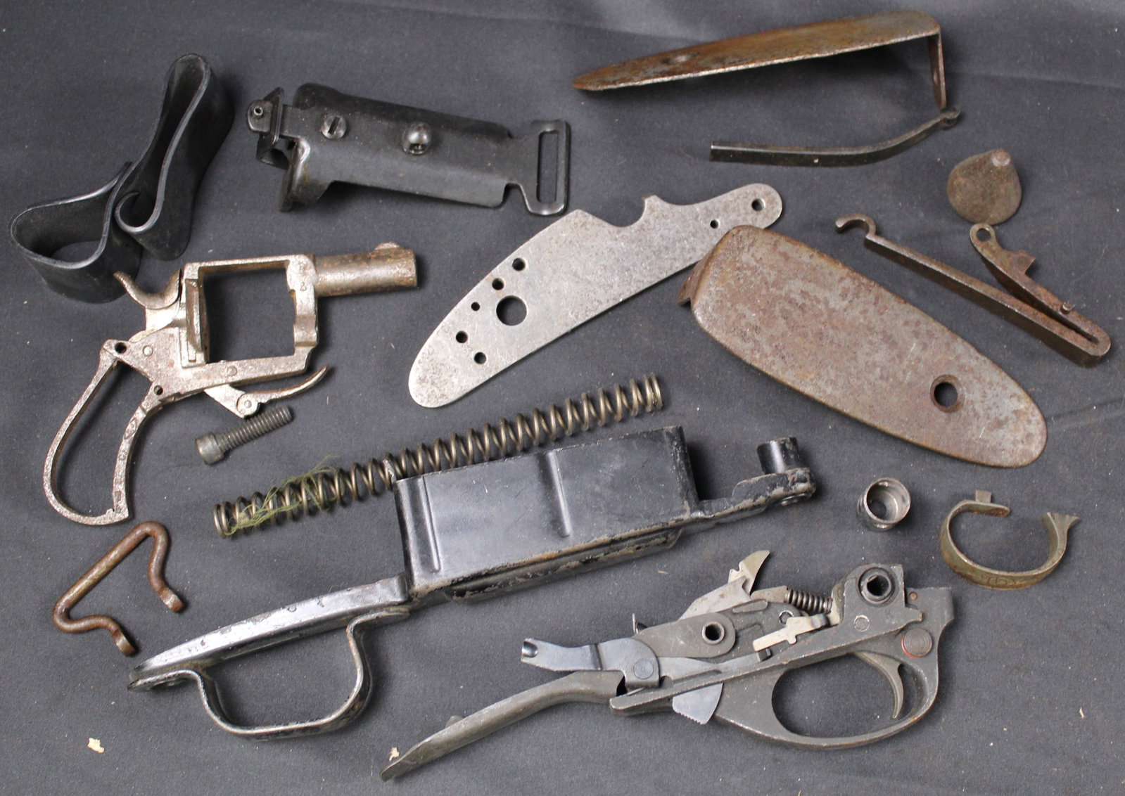 Group Lot: Firearms Parts Lot (FMI): Description coming soon Bidders are welcome to preview items in person during our normal operating hours Tuesday through Saturday 11am-6pm. Estimated shipping parcel size (LxWxH) 10 inches x 8 inches 