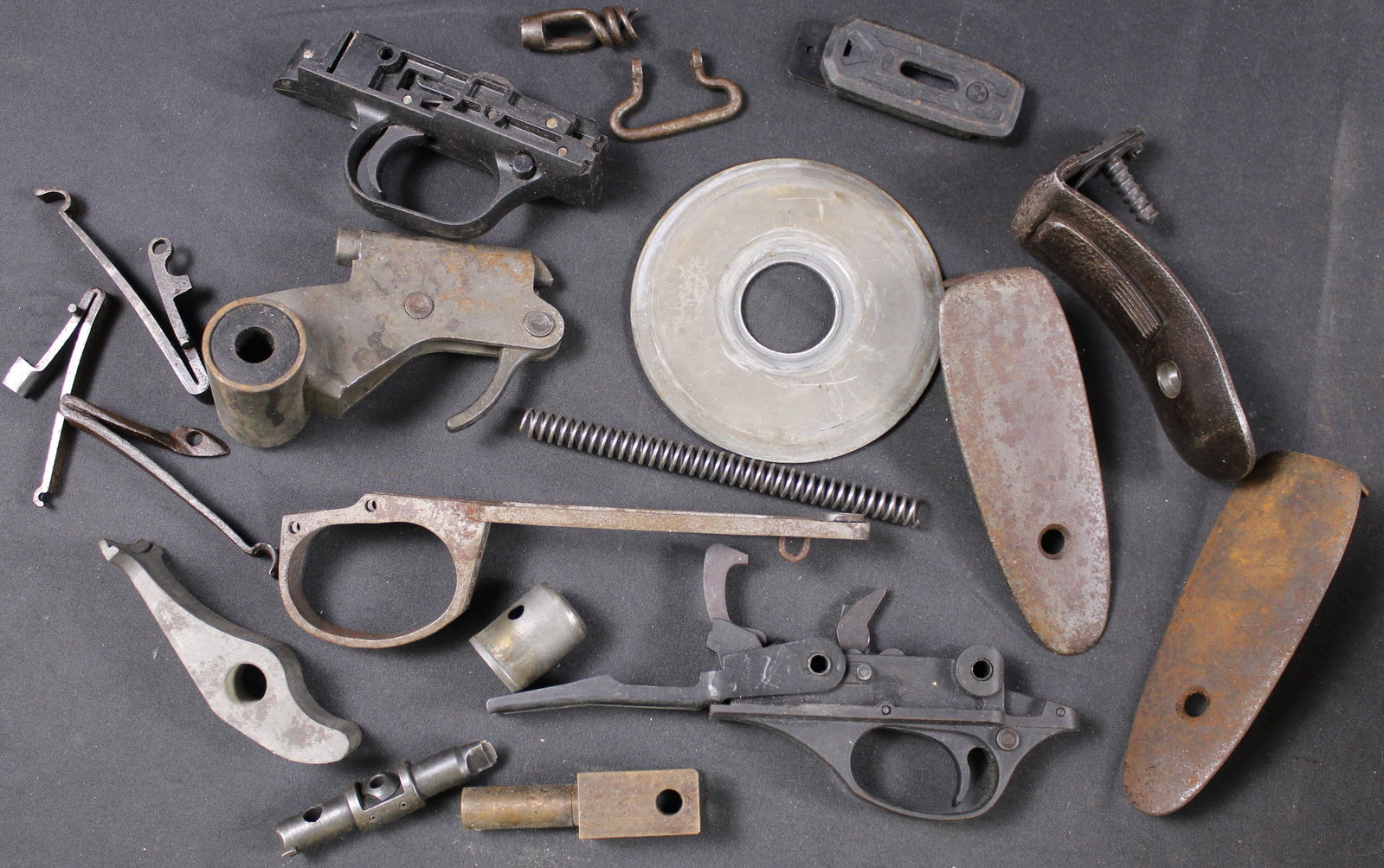 Group Lot: Firearms Parts Lot (FMI): Description coming soon Bidders are welcome to preview items in person during our normal operating hours Tuesday through Saturday 11am-6pm. Estimated shipping parcel size (LxWxH) 10 inches x 8 inches