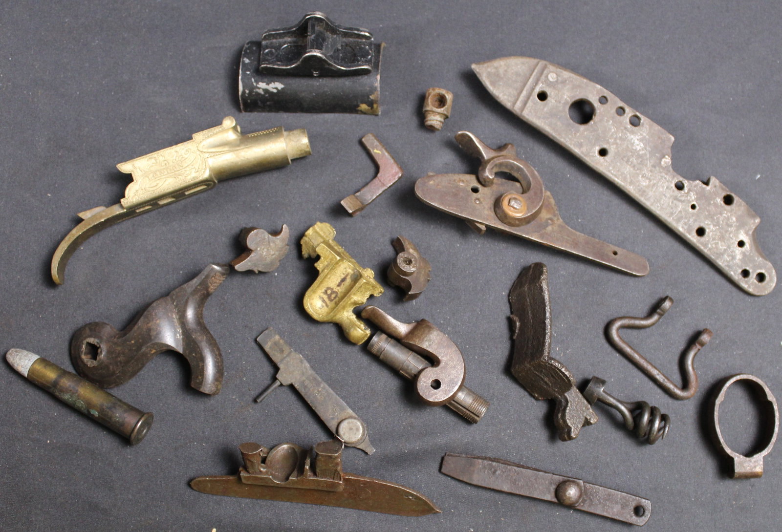 Group Lot: Firearms Parts Lot (FMI): Description coming soon Bidders are welcome to preview items in person during our normal operating hours Tuesday through Saturday 11am-6pm. Estimated shipping parcel size (LxWxH) 10 inches x 8 inches