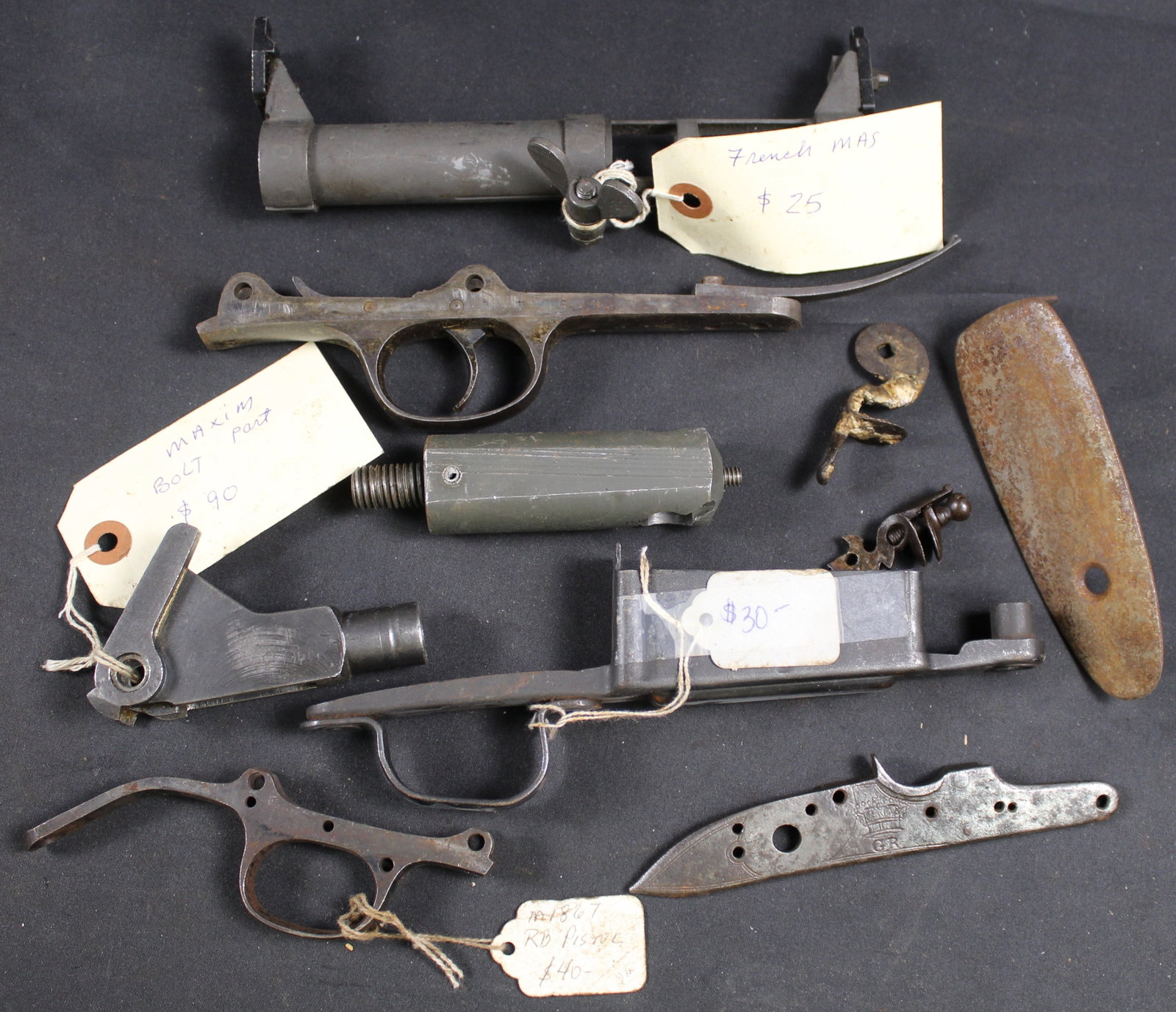 Group Lot: Firearms Parts Lot (FMI): Description coming soon Bidders are welcome to preview items in person during our normal operating hours Tuesday through Saturday 11am-6pm. Estimated shipping parcel size (LxWxH) 10 inches x 8 inches 
