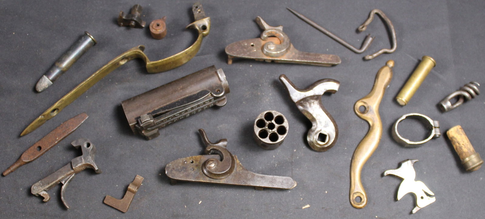 Group Lot: Firearms Parts Lot (FMI): Description coming soon Bidders are welcome to preview items in person during our normal operating hours Tuesday through Saturday 11am-6pm. Estimated shipping parcel size (LxWxH) 10 inches x 8 inches