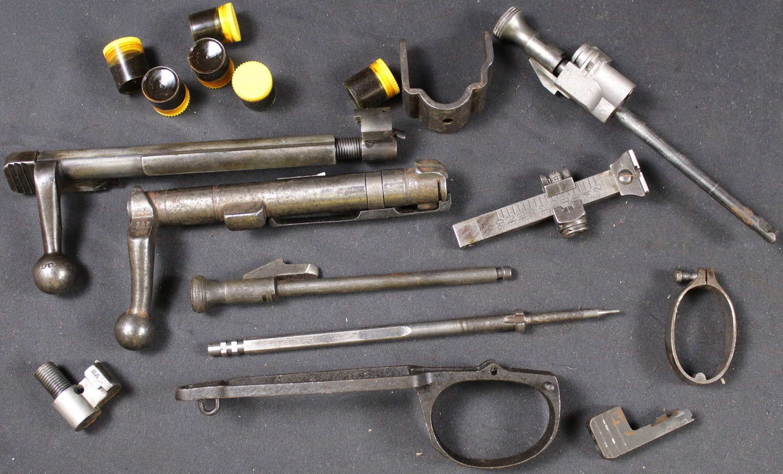 Group Lot: Firearms Parts Lot (FMI): Description coming soon Bidders are welcome to preview items in person during our normal operating hours Tuesday through Saturday 11am-6pm. Estimated shipping parcel size (LxWxH) 10 inches x 8 inches