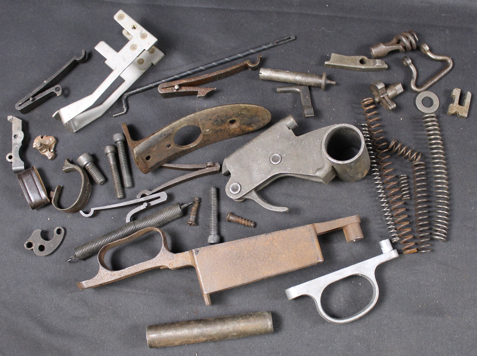 Group Lot: Firearms Parts Lot (FMI): Description coming soon Bidders are welcome to preview items in person during our normal operating hours Tuesday through Saturday 11am-6pm. Estimated shipping parcel size (LxWxH) 10 inches x 8 inches 
