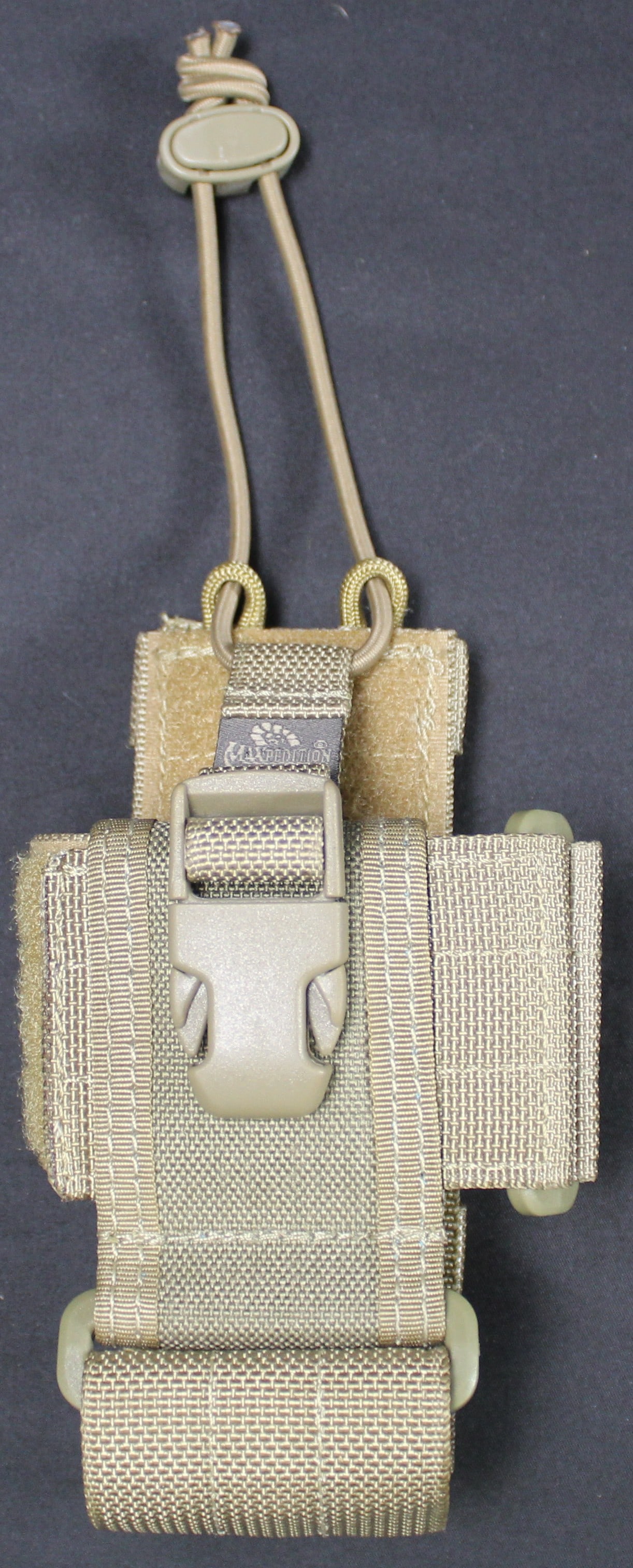Khaki Coloered Tactical Magazine Carry Pouch by Maxpadition (VCW): Description coming soon Bidders are welcome to preview items in person during our normal operating hours Tuesday through Saturday 11am-6pm. Estimated shipping parcel size (LxWxH) 10 inches x 6 inches 
