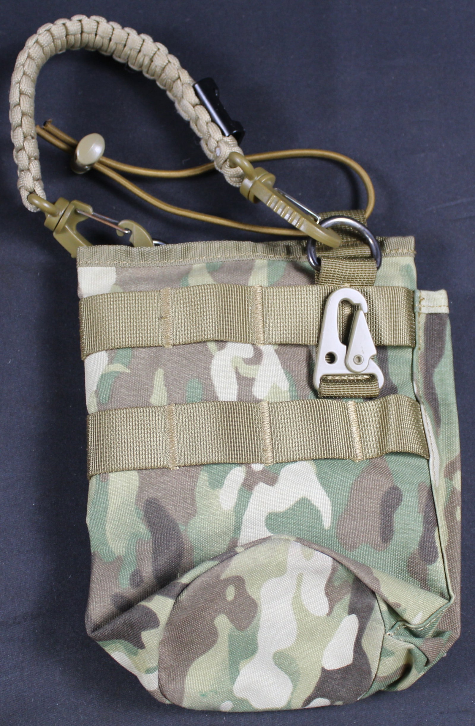 Unmarked Camouflage Tactical Carry Pouch: Description coming soon Bidders are welcome to preview items in person during our normal operating hours Tuesday through Saturday 11am-6pm. Estimated shipping parcel size (LxWxH) 10 inches x 6 inches 