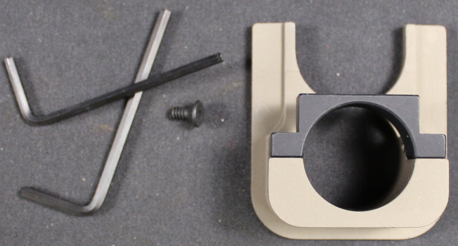 Midwest Industries TAVOR Handgaurd Light Mount (DMS): This Midwest Industries Handguard Light Mount is specifically designed for the IWI Tavor rifle. This piece is in good condition and seems to be missing one side setscrew. Bidders are welcome to