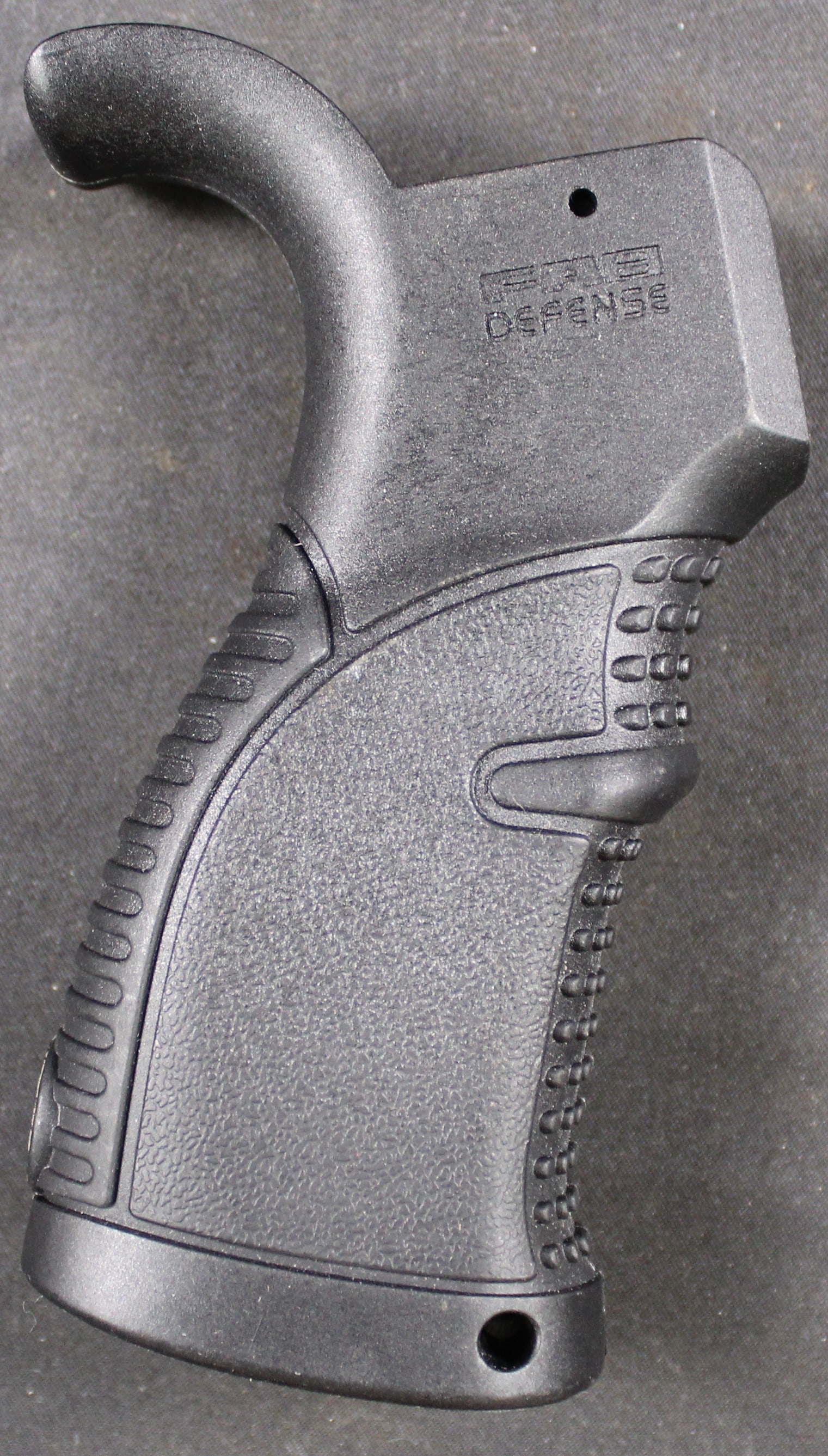 FAB DEFENSE Ergonomic Pistol Grip (DMS): This FAB DEFENSE AGR-43 Ergonomic Pistol Grip is designed for AR-15's. This piece is in good condition and shows very little wear. Bidders are welcome to preview items in person during our normal
