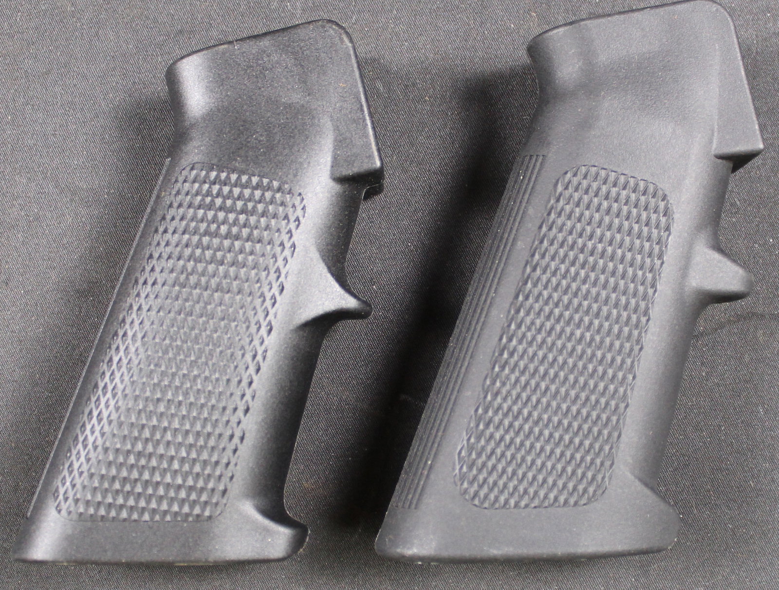 Group Lot: Two Suspected MIL-SPEC A2 Style Pistol Grips (DMS): These suspected MIL-SPEC A2 Style Pistol Grips are in good condition as they show very little wear. Bidders are welcome to preview items in person during our normal operating hours Tuesday through