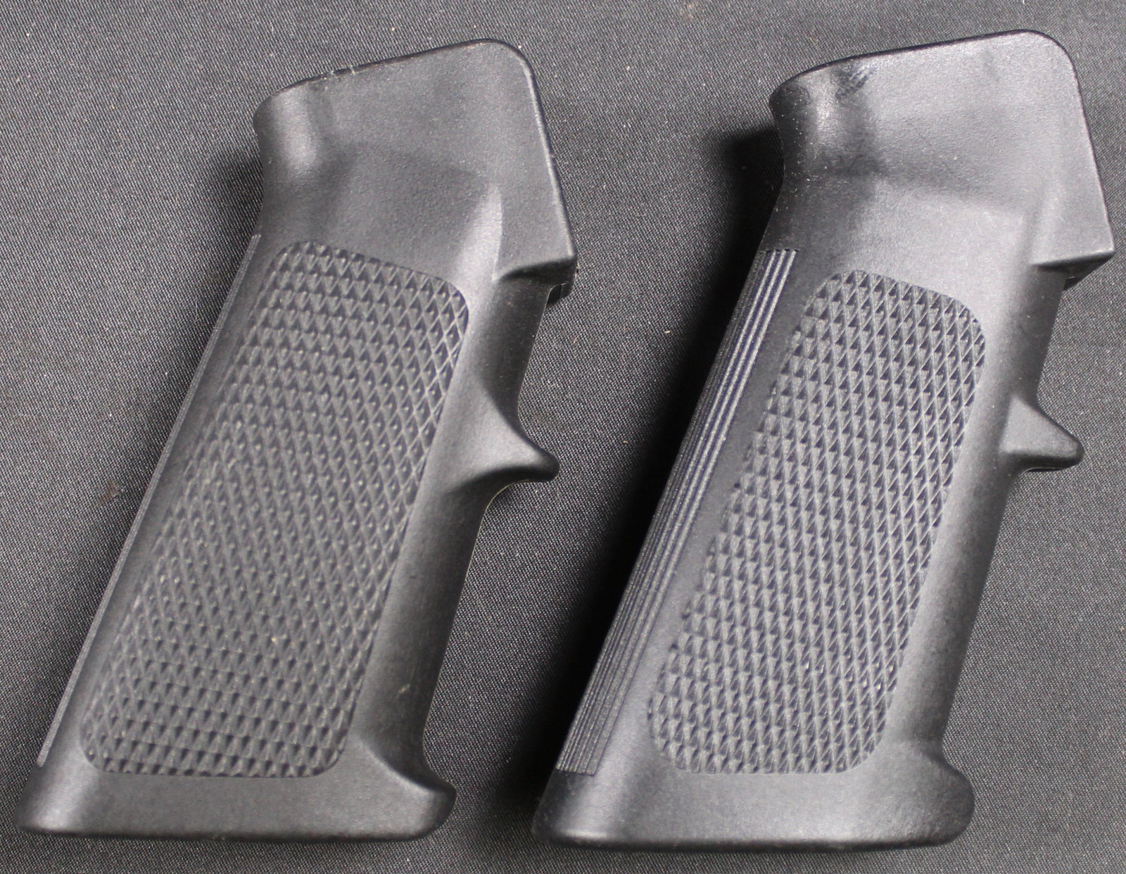 Group Lot: Two Suspected MIL-SPEC A2 Style Pistol Grips (DMS): These suspected MIL-SPEC A2 Style Pistol Grips are in good condition as they show very little wear. Bidders are welcome to preview items in person during our normal operating hours Tuesday through