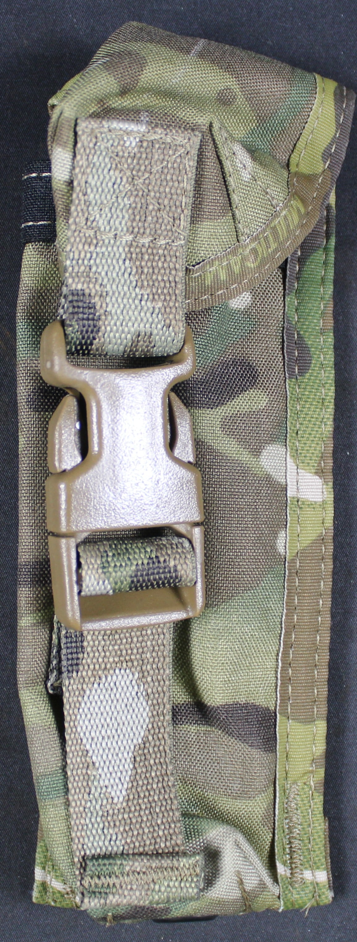 Suspected Multi-Cam Flare Pouch (DMS): Suspected Multi-Cam Flare Pouch that is overall in good to very good condition not showing any wear, and has a buckle that is perfectly in tact. Bidders are welcome to preview items in person during