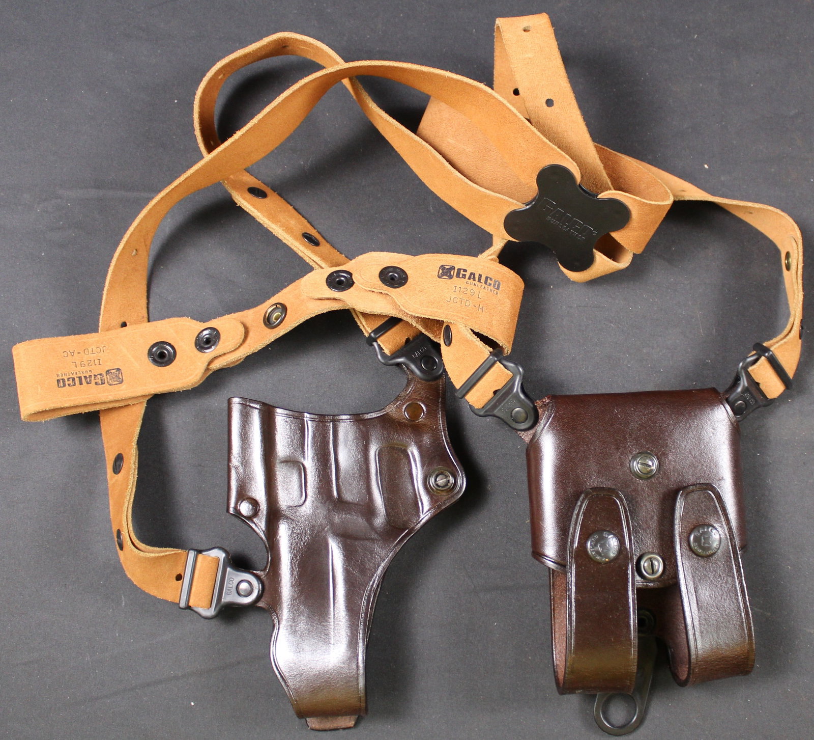 GALCO GUNLEATHER Leather Holster and Body Harness (DMS): This GALCO GUNLEATHER Leather Holster and Body Harness is in very good condition with little signs of wear. The holster is stamped with "G129WCD" and "J248H". Meaning this fits the Sig Sauer P220 and