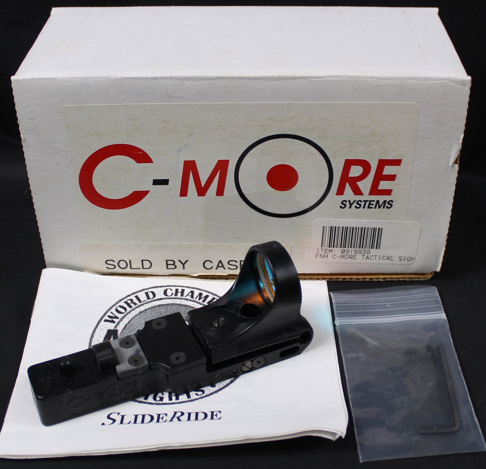 C-MORE Systems Red Dot Sight (HRR): This C-MORE Systems Red Dot Sight is in good to very good condition as it shows very little signs of use and very little wear. This piece comes in its original box as well. Bidders are welcome to