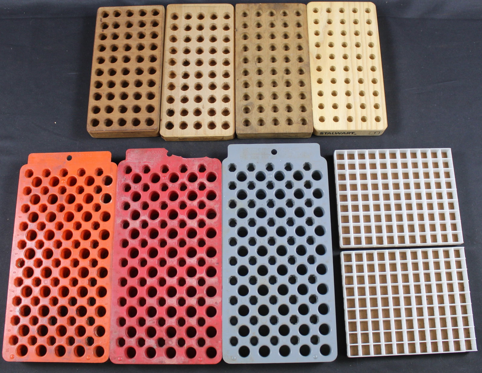 Group Lot: Eight Reloading Cartrige Holding Trays (FMI): Description coming soon Bidders are welcome to preview items in person during our normal operating hours Tuesday through Saturday 11am-6pm. Estimated shipping parcel size (LxWxH) 12 inches x 8 inches