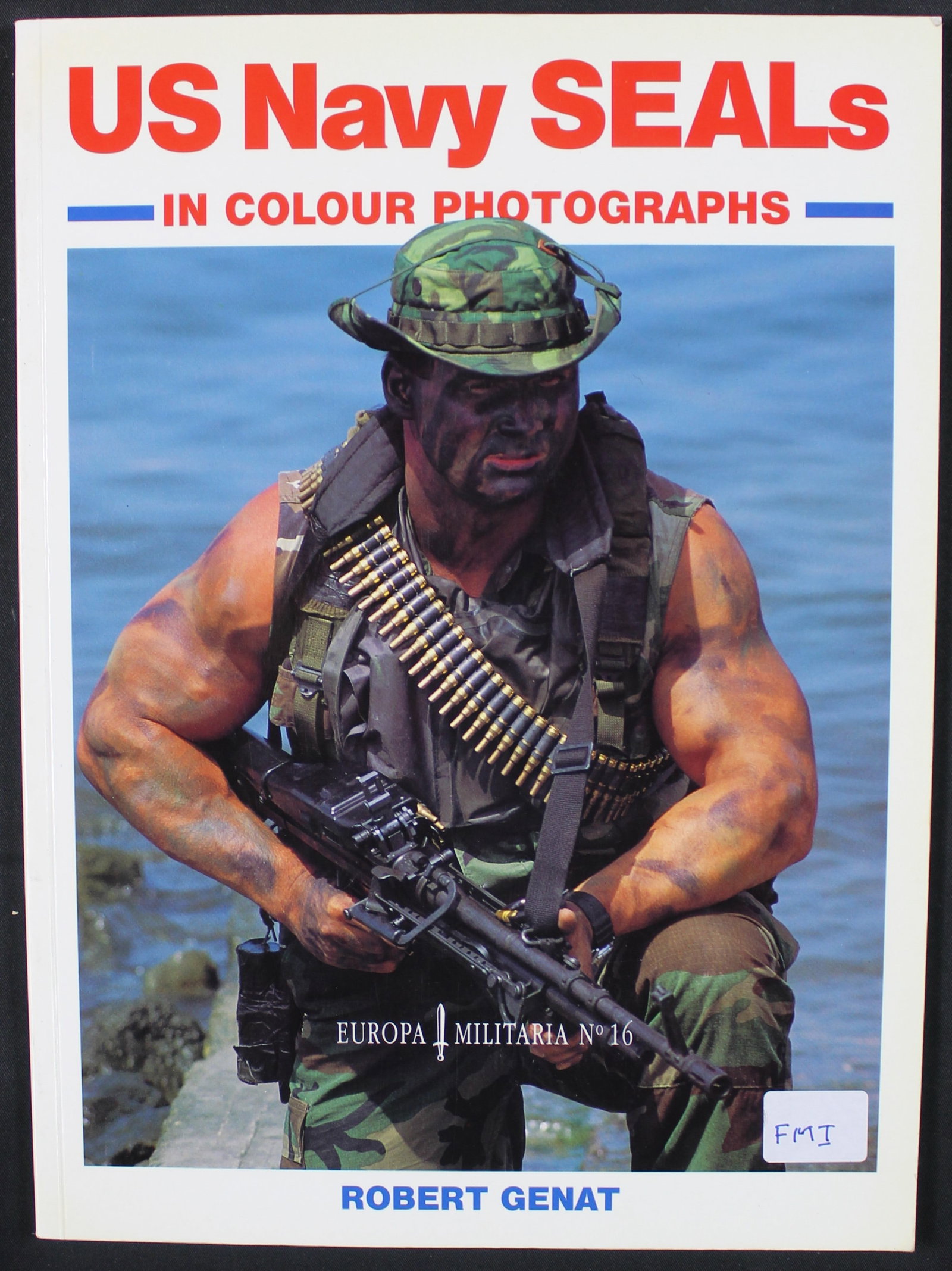 "US Navy SEALs In Colour Photographs" by Robert Ganat (FMI): A paperback copy of "US Navy SEALs In Colour Photographs" by Robert Ganat in very good condition overall. This book features many color photographs and stories of Navy SEALs in action with a sales