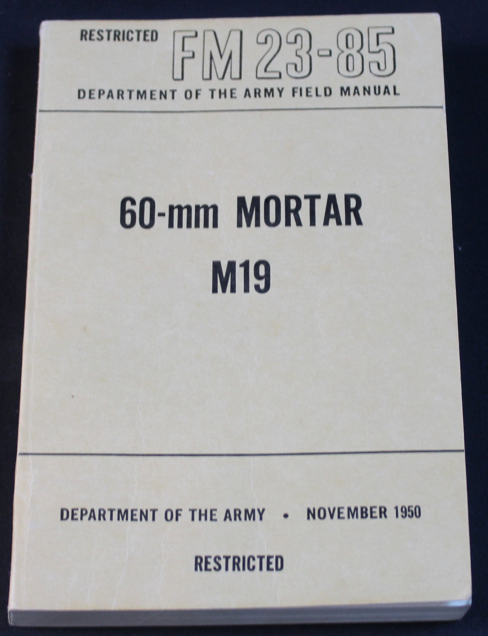 US Department of the Army Field Manual: "60-mm Mortar M19" c.1950 (FMI): A paperback copy of FM 23-85 US Department of the Army Field Manual: "60-mm Mortar M19" c.1950 (Korean War era) in very good condition overall. The US Department of the Army Field Manual FM 23-85: