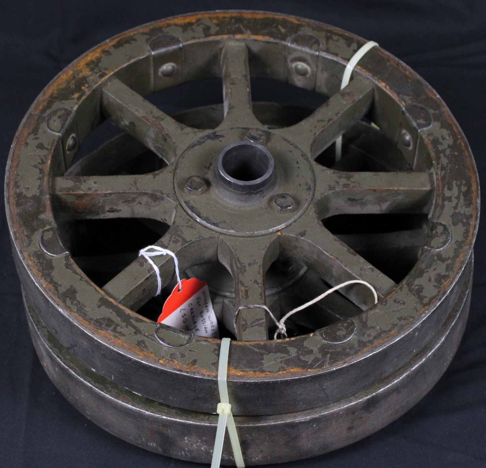 Russian MG Carriage Wheels (FMI): A pair of SG43 Goryuno carriage wheels. Both wheels are in good condition with a circumference of 12". These wheels also include the "hub and pin" to secure the wheels on the axel. Bidders are