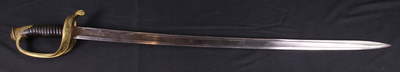1868 French Infantry Officer Sabre by Zhornof: This 1868 French infantry officer sabre model 1855 is suspected to be original and made by a rare manufacturer, the Manufacture du Zhornof in the Bas-Rhin region. This sabre does not have the