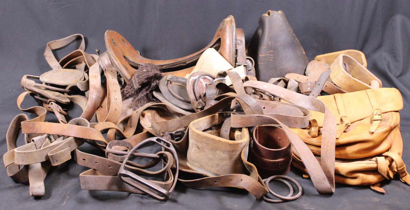 Large Group Lot: WWI USGI and USMC Saddle and Bridal Accessories (FMI): Description coming soon! Bidders are welcome to preview items in person during our normal operating hours Tuesday through Saturday 11am-6pm. Estimated shipping parcel size (LxWxH) 24 inches x 24 inche